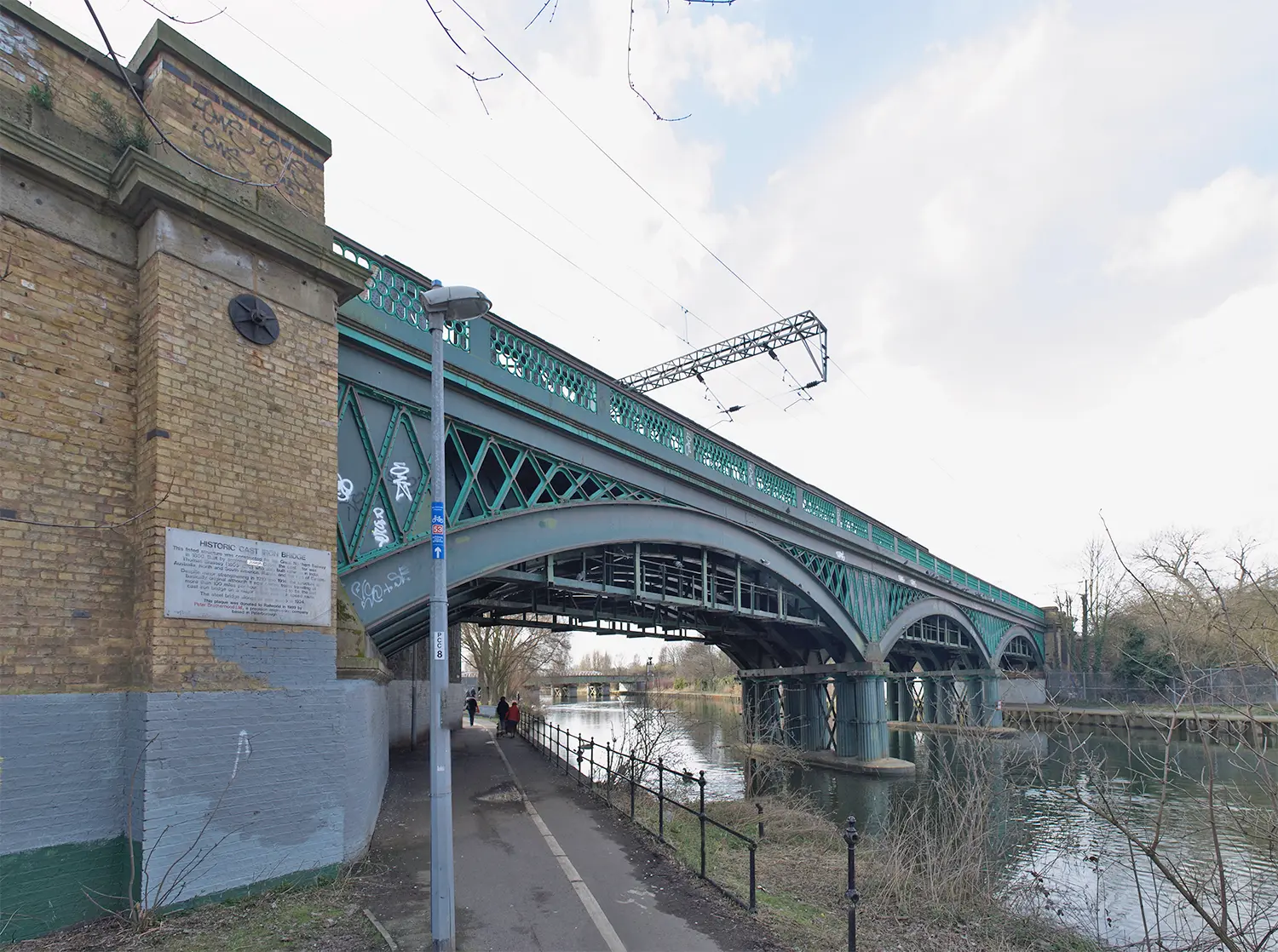 The historic cast iron Nene Viaduct carrying the East Coast Main Line across the River Nene in Peterborough
