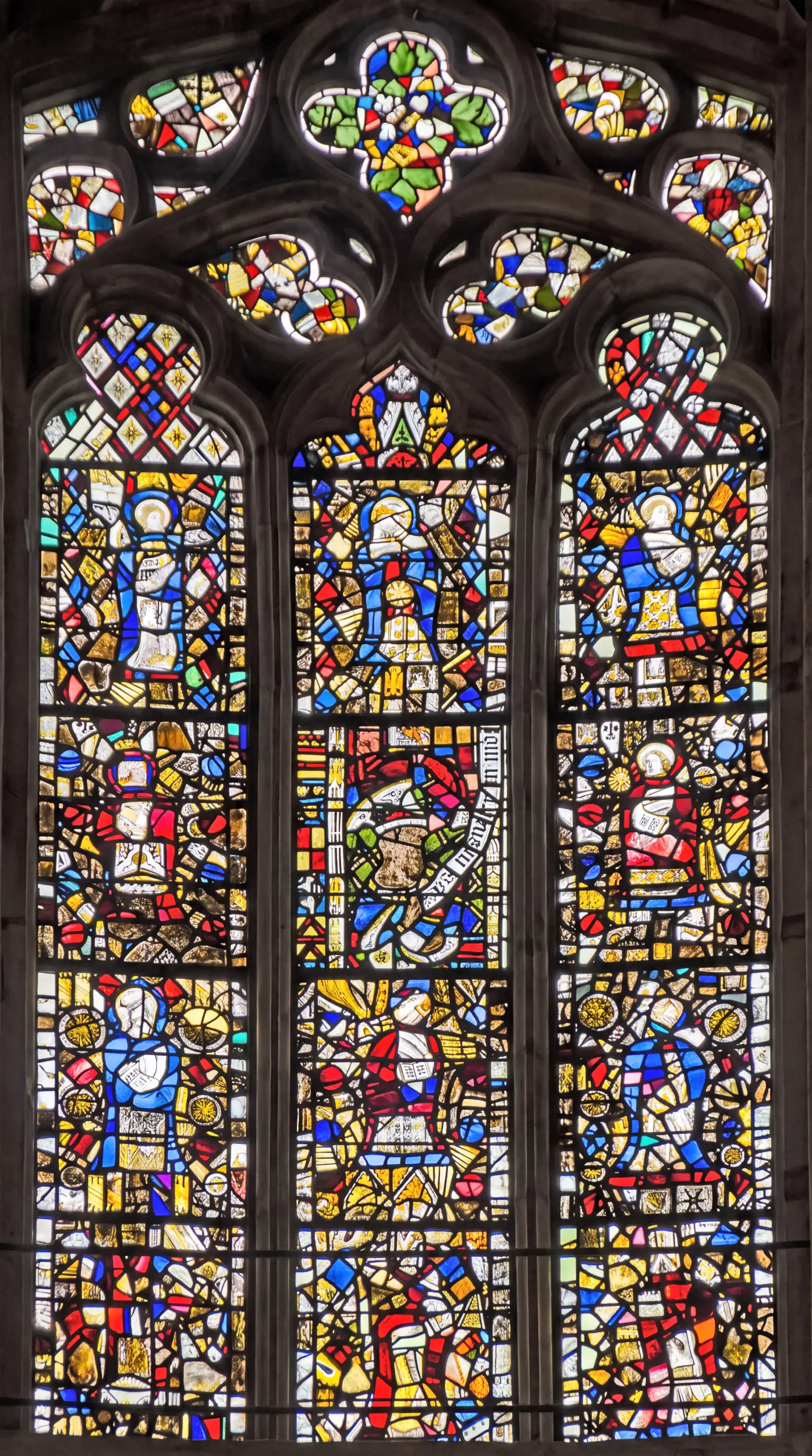 Medieval stained glass fragments reset in an apse window at Peterborough Cathedral